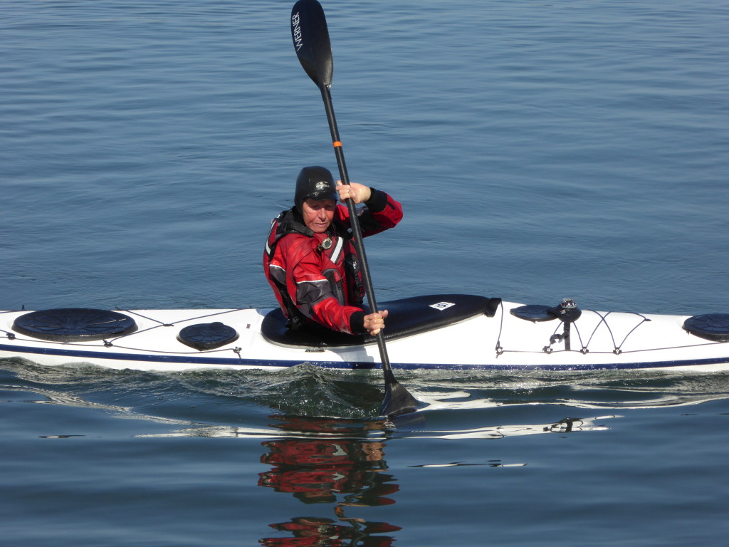 Keep the paddle at near-vertical and don't lean out too far.